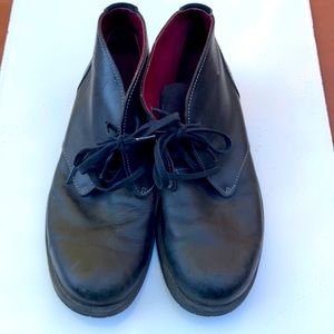 Clarks Chukka boots in black.